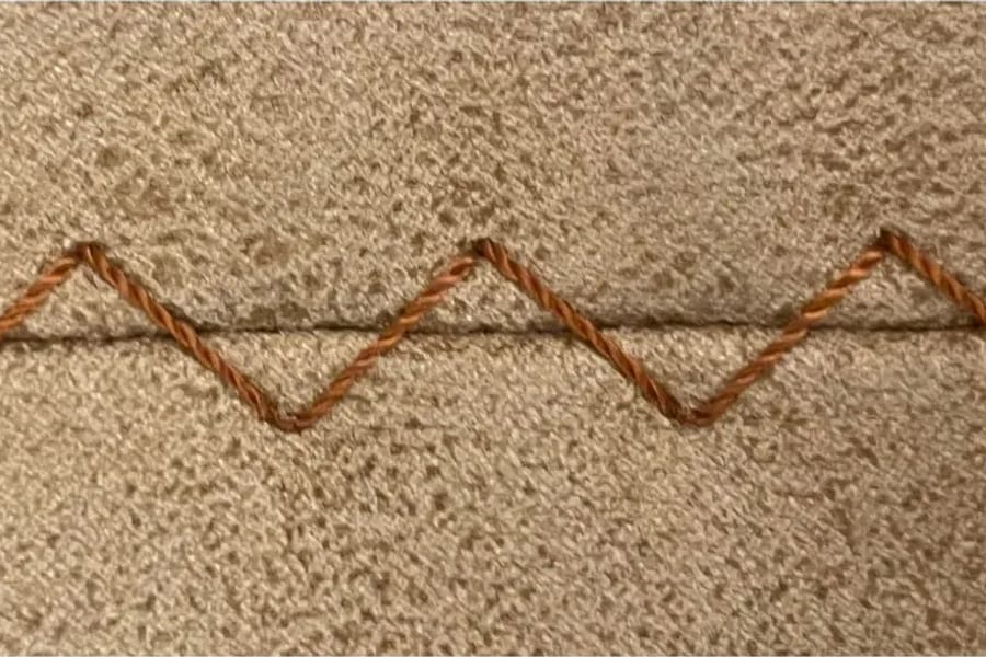 N1-1: a zigzag stitch over a seam