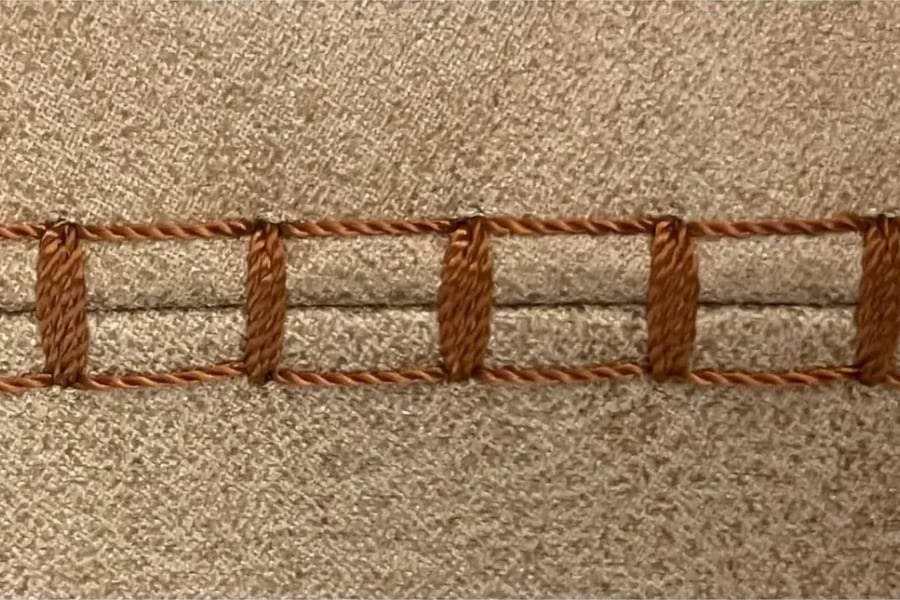 N3-2: a ladder of bars between two seam lines